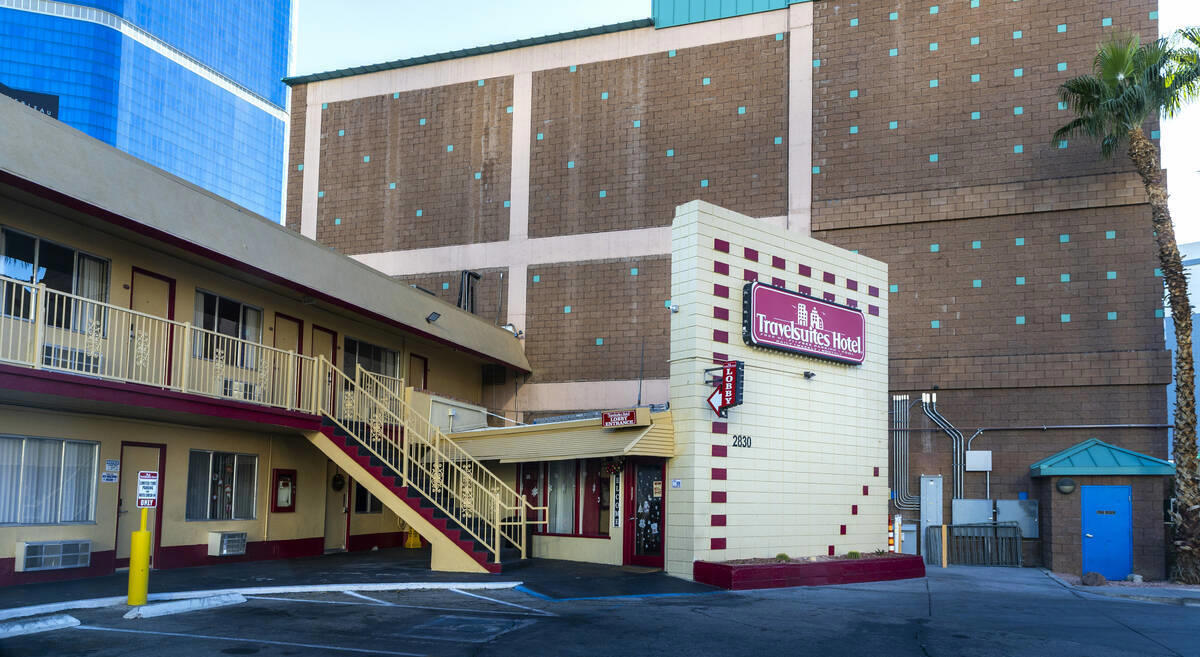 North Strip motel, Catholic church, Silver City Casino sign, Apartments behind Treasure Island, Jockey Club