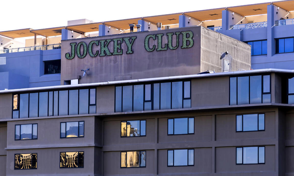 North Strip motel, Catholic church, Silver City Casino sign, Apartments behind Treasure Island, Jockey Club