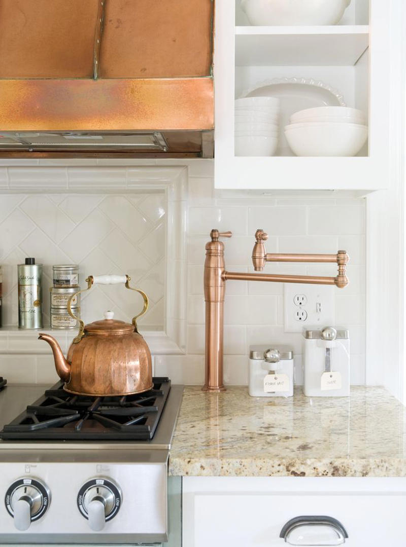 1. Cashmere Kitchens: Refined Warm Neutrals, 2. Wood Cabinetry, 3. Two-Tone Cabinetry, 4. Appliances in Bold Hues, 5. Nature-Inspired and Earth-Toned Backsplashes, 6. Cream and Beige Taj Mahal Countertops, 7. Mixed Metals, 8. Stainless Steel as a Design Statement, 9. Natural Stone Countertops, 10. Add Color and Texture with Mesh Insert Cabinetry