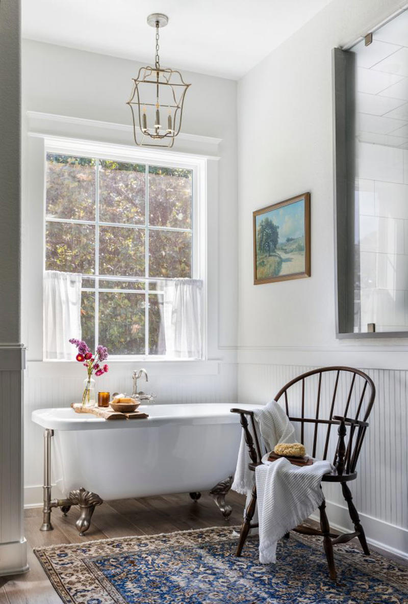 1. Traditional Window Treatment Designs, 2. Cafe Curtains: Hung on Their Own or Paired with Roman Shades, 3. Statement Drapery, 4. Outside Mounted Roman Shades, 5. Bronze Hardware, 6. Natural Woven Shades, 7. Layered Window Treatments