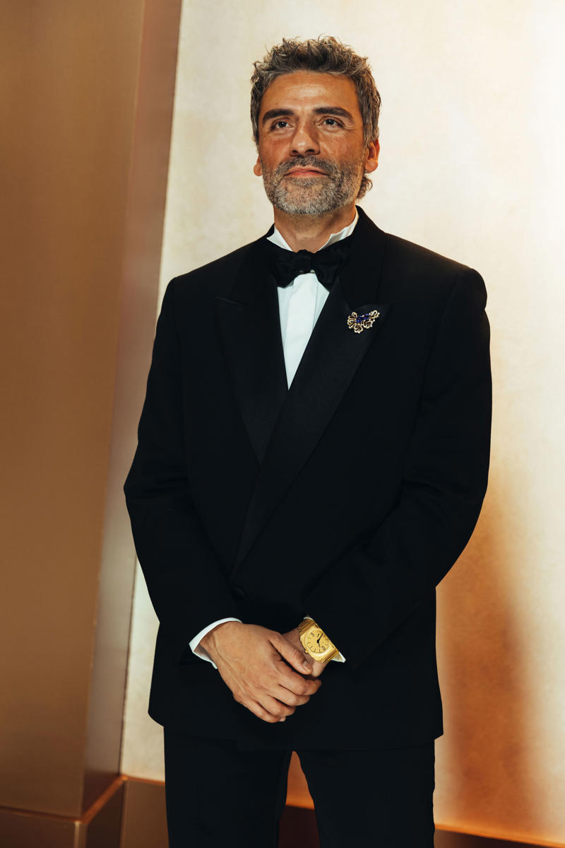 Stellan Skarsgård’s Omega Seamaster Aqua Terra Shades Moonshine Gold, Sterling K. Brown’s Audemars Piguet Royal Oak Perpetual Calendar, Timothée Chalamet’s Urban Jürgensen UJ-2, Chris Pine’s Cartier Tank Louis Cartier, Walton Goggins’ Cartier Tonneau, John Krasinski’s Glashütte Original Vintage Sixties, Colman Domingo’s Omega Speedmaster 38MM, Paul Mescal’s Cartier Tortue, Dwayne Johnson’s Chopard Alpine Eagle Frozen Summit, Jeremy Allen White’s Louis Vuitton Tambour, Wagner Moura’s Omega De Ville Trésor 40 mm, Jake Lacy’s Jaeger-LeCoultre Reverso Duoface Small Seconds, Glen Powell’s Omega Seamaster Aqua Terra 150M Moonshine Gold, Tramell Tillman’s Audemars Piguet Royal Oak “Jumbo” Extra-Thin Openworked, Oscar Isaac’s Bulgari Octo Finissimo, Marlon Wayans’ Omega Speedmaster Canopus Gold, Jacob Elordi’s Cartier Tank Normale, Adam Brody’s Jaeger-LeCoultre Reverso Tribute Monoface Small Seconds, Kumail Nanjiani’s Vacheron Constantin Overseas Perpetual Calendar Ultra-Thin, Orlando Bloom’s Porsche Design Chronograph 1 - 1975 Limited Edition, Benny Blanco’s Jacob & Co., Connor Storrie’s Tiffany & Co. Union Square, Leonardo DiCaprio’s Rolex Cosmograph Daytona “Le Mans”, Hudson Williams’ Bulgari Serpenti, Nick Jonas’s Fossil Carraway, George Clooney’s Omega Seamaster Aqua Terra 150M, Dylan Efron’s TAG Heuer Carrera Astronomer 39mm, Luke Grimes’ Blancpain Villeret Quantième Complet