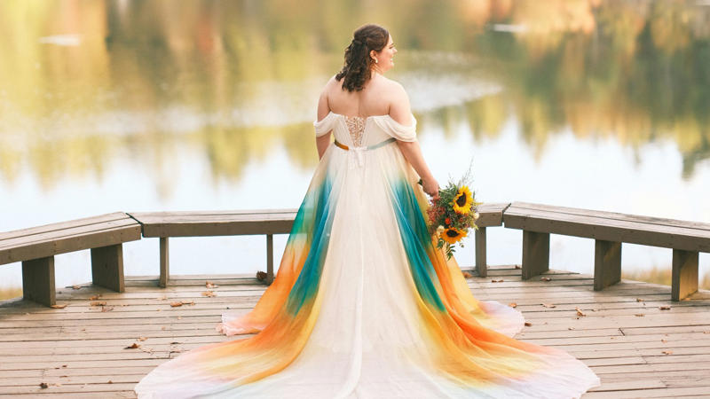 4. Colored Gown 1. Short and Chic, 2. Bridal Jumpsuit, 3. Two-Piece Set, 4. Colored Gown, 5. Black Bridal Look, 6. Cape Moment, 7. Detachable Overskirt, 8. Statement Sleeves, 9. High Neckline, 10. Deep V Drama, 11. Open-Back Stunner, 12. Sheer Illusion Details, 13. Corset Bodice, 14. Slip Dress, 15. Feather Accents, 16. Metallic Shine, 17. Floral 3D Appliqué, 18. Opt For The Tux, 19. Dramatic Train, 20. Vintage-Inspired Twist