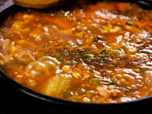 Spicy Korean Seafood Soup, Soondubu Jjigae (Korean Soft Tofu Stew), Doenjang Jjigae (Korean Fermented Bean Paste Stew), Miyeok-Guk (Korean Seaweed and Brisket Soup), Homemade Shin Cup-Style Spicy Korean Ramyun Beef Noodle Soup, Dak Juk (Korean Chicken and Rice Porridge), Hobak Beombeok (Korean Squash, Sweet Potato, and Bean Porridge), Baechu Kimchi (Napa Cabbage Kimchi), Tteokbokki (Korean Rice Cakes), Korean Corn Cheese