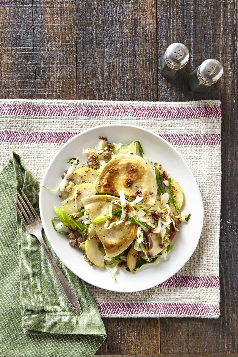 Seared Sausage with Cabbage and Pink Lady Apples, Butter-Braised Cabbage with Cream and Garlic, Baked Cabbage and Potato Buns (Piroshki), Bacon-Cabbage Panzanella, Honey Mustard Roasted Chicken and Cabbage, Sausage, Potato, and Cabbage Soup, Pierogies with Sausage, Cabbage &amp; Pear, Roasted Red Cabbage-and-Collard Green Slaw