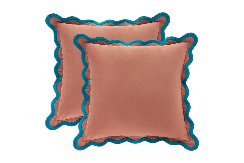 Designer-Approved Living Room Decor on Amazon, Monday Moose Set of 2 Scalloped Velvet Throw Pillow Covers, Geezo Electric Candle Warmer Lamp, "Wild Interiors" by Hilton Carter, Craig Frames 16” by 20” Ornate Gold Frame, Firminana Mid-Century Modern Coffee Table, Etspolt Set of 4 Multicolor Acrylic Coasters, Loloi x Rifle Paper Co. Eden Mughal Garden Cream 5’ by 7’ Area Rug, Paddywax Checkmate Artisan Hand-Poured Scented Candle, Oakoa Fluted Round Concrete Tray, Brightech Luna Drop LED Floor Lamp, Tiita Rattan Glass Top Side Table