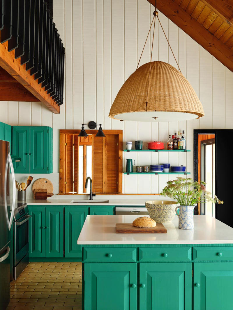 Boring Can Lights, Too Many Materials , A Big, Bulky Built-In Island, Two-Toned Cabinetry, Upper Cabinets, Ho-Hum Countertops , Countertop Drying Racks
