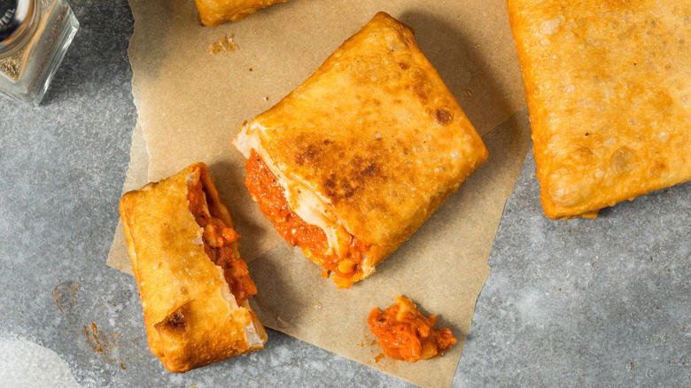 Chicago Dogs, Deep Dish Pizza, Italian Beef, Jibaritos, Tavern-Style Pizza, Garrett Popcorn, Chicago-Style Giardiniera, Pizza Puffs, Flaming Saganaki