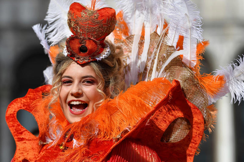 Fat Tuesday , Bead Throwing, Rex, the King of the Carnival, Purple, Gold, and Green, King Cake, Zulu Coconuts, Flambeaux, Worldwide Revelry