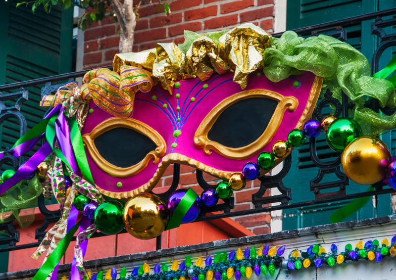 Fat Tuesday , Bead Throwing, Rex, the King of the Carnival, Purple, Gold, and Green, King Cake, Zulu Coconuts, Flambeaux, Worldwide Revelry