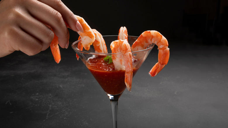 Shrimp cocktail, Molded Jell-O, Cabbage dumplings, French onion soup, Layered dips, Pasta salad, Arctic roll, Tuna noodle casserole, Deviled eggs