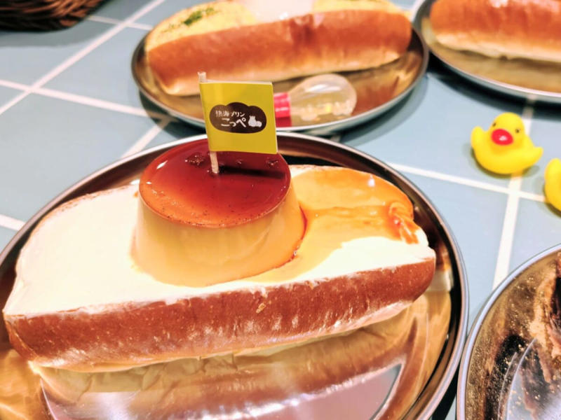 熱海プリン6店舗目！工房併設のイートインタイプでオープン, ファクトリー限定・熱海プリンこっぺ, ファクトリー限定・出来立て 皿プリン, ファクトリー限定・湯あがり３姉妹, ファクトリー限定・お風呂あがり入浴セット（2種類）, ファクトリー限定・湯あがりかばさん焼き, ファクトリー限定・新発売のお土産, キュートなグッズ, まとめ：イートイン・食べ歩きで熱海を満喫