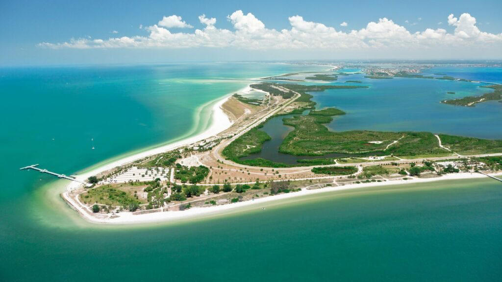 1. Clearwater Beach, 2. Siesta Beach, 3. Cocoa Beach Pier, 4. Anastasia State Park Beach, 5. Stuart Beach, 6. Red Reef Park, 7. Manatee Public Beach, 8. Fort De Soto Park, 9. Deerfield Beach, 10. Hollywood Beach, 11. Crandon Park Beach, 12. Clam Pass Park Beach, 13. Grayton Beach State Park, 14. Russell-Fields City Pier and Beach