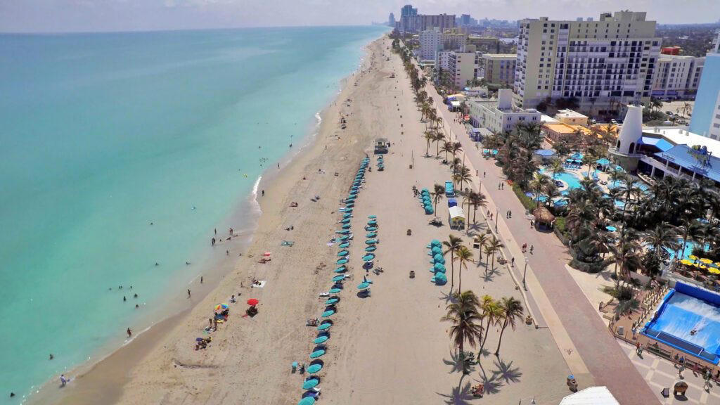 1. Clearwater Beach, 2. Siesta Beach, 3. Cocoa Beach Pier, 4. Anastasia State Park Beach, 5. Stuart Beach, 6. Red Reef Park, 7. Manatee Public Beach, 8. Fort De Soto Park, 9. Deerfield Beach, 10. Hollywood Beach, 11. Crandon Park Beach, 12. Clam Pass Park Beach, 13. Grayton Beach State Park, 14. Russell-Fields City Pier and Beach