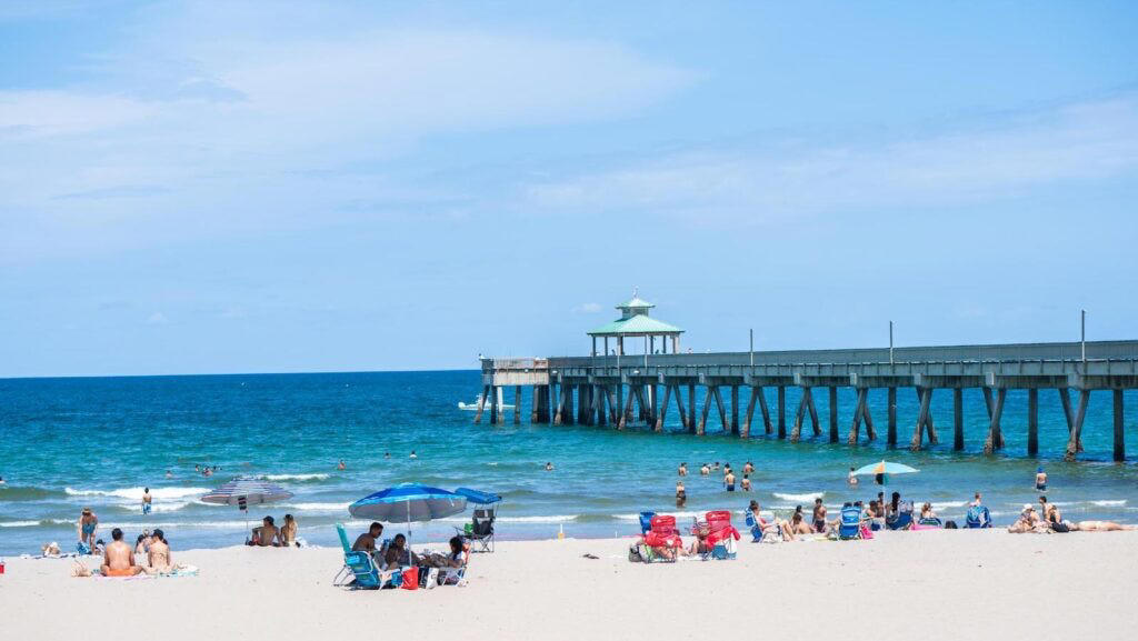 1. Clearwater Beach, 2. Siesta Beach, 3. Cocoa Beach Pier, 4. Anastasia State Park Beach, 5. Stuart Beach, 6. Red Reef Park, 7. Manatee Public Beach, 8. Fort De Soto Park, 9. Deerfield Beach, 10. Hollywood Beach, 11. Crandon Park Beach, 12. Clam Pass Park Beach, 13. Grayton Beach State Park, 14. Russell-Fields City Pier and Beach