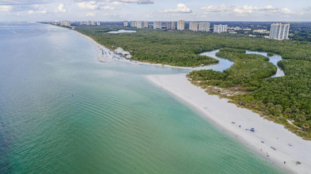 1. Clearwater Beach, 2. Siesta Beach, 3. Cocoa Beach Pier, 4. Anastasia State Park Beach, 5. Stuart Beach, 6. Red Reef Park, 7. Manatee Public Beach, 8. Fort De Soto Park, 9. Deerfield Beach, 10. Hollywood Beach, 11. Crandon Park Beach, 12. Clam Pass Park Beach, 13. Grayton Beach State Park, 14. Russell-Fields City Pier and Beach