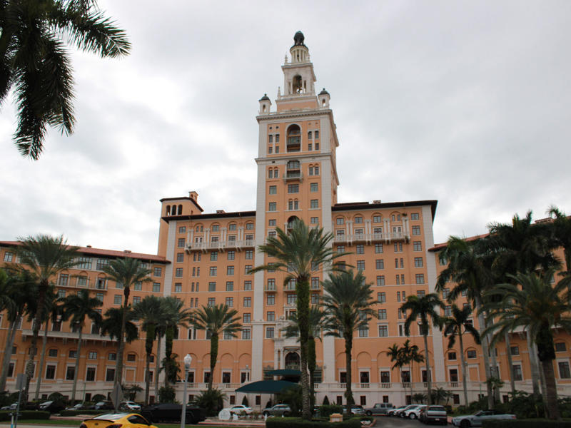 Today, the hotel is loved by high-profile figures. Today, the hotel is loved by high-profile figures., Inside, the hotel has kept its original, century-old lobby., The lobby decorations match the hotel's historic, elevated vibe., The lobby also serves as a dining area for afternoon tea., Downstairs, the hotel's Fontana restaurant partially sits in an open-air courtyard., Fontana serves Italian-inspired dishes., Brandi's, the hotel's dark, moody bar, draws inspiration from the Biltmore's past., At the 600-gallon pool, there's poolside dining and nine private cabanas., The Biltmore's clubhouse is the center of events at the property., Next to the course are spaces for relaxing and socializing., Tucked in the clubhouse, there's also a members-only lounge.