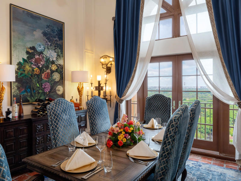 Named after Coral Gables' developer, the Merrick Suite is at the top of the tower. Today, the hotel is loved by high-profile figures., Inside, the hotel has kept its original, century-old lobby., The lobby decorations match the hotel's historic, elevated vibe., The lobby also serves as a dining area for afternoon tea., Downstairs, the hotel's Fontana restaurant partially sits in an open-air courtyard., Fontana serves Italian-inspired dishes., Brandi's, the hotel's dark, moody bar, draws inspiration from the Biltmore's past., At the 600-gallon pool, there's poolside dining and nine private cabanas., The Biltmore's clubhouse is the center of events at the property., Next to the course are spaces for relaxing and socializing., Tucked in the clubhouse, there's also a members-only lounge.