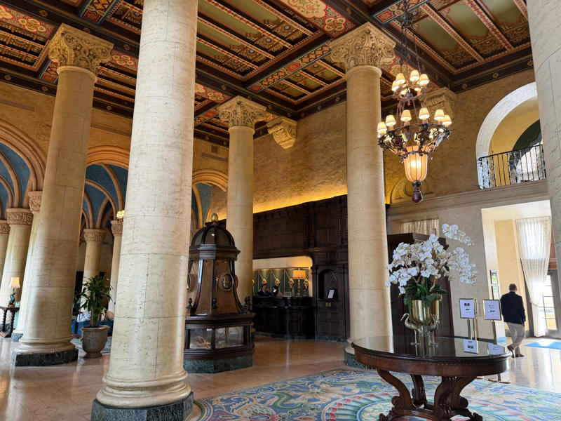 Inside, the hotel has kept its original, century-old lobby. Today, the hotel is loved by high-profile figures., Inside, the hotel has kept its original, century-old lobby., The lobby decorations match the hotel's historic, elevated vibe., The lobby also serves as a dining area for afternoon tea., Downstairs, the hotel's Fontana restaurant partially sits in an open-air courtyard., Fontana serves Italian-inspired dishes., Brandi's, the hotel's dark, moody bar, draws inspiration from the Biltmore's past., At the 600-gallon pool, there's poolside dining and nine private cabanas., The Biltmore's clubhouse is the center of events at the property., Next to the course are spaces for relaxing and socializing., Tucked in the clubhouse, there's also a members-only lounge.