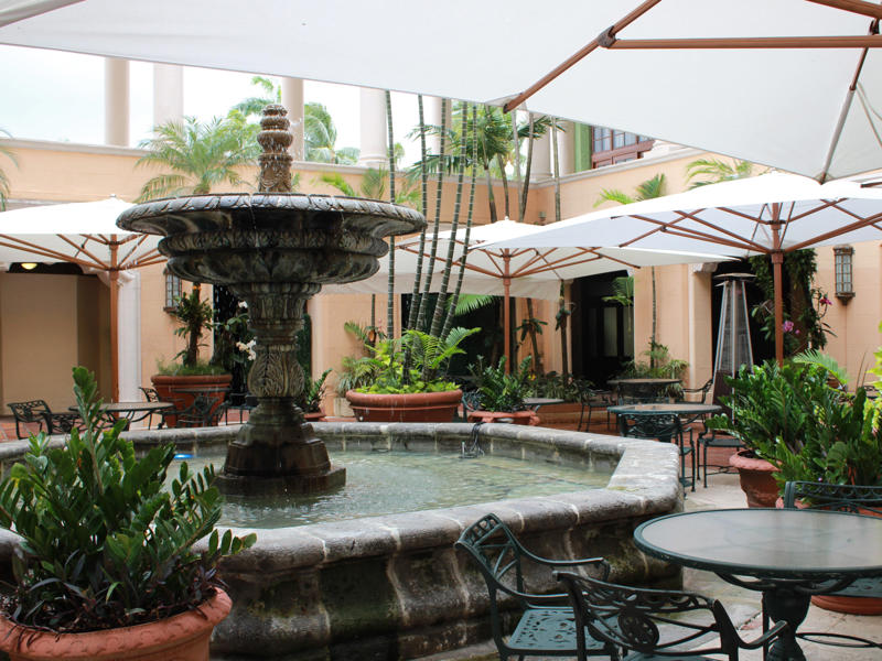 Downstairs, the hotel's Fontana restaurant partially sits in an open-air courtyard. Today, the hotel is loved by high-profile figures., Inside, the hotel has kept its original, century-old lobby., The lobby decorations match the hotel's historic, elevated vibe., The lobby also serves as a dining area for afternoon tea., Downstairs, the hotel's Fontana restaurant partially sits in an open-air courtyard., Fontana serves Italian-inspired dishes., Brandi's, the hotel's dark, moody bar, draws inspiration from the Biltmore's past., At the 600-gallon pool, there's poolside dining and nine private cabanas., The Biltmore's clubhouse is the center of events at the property., Next to the course are spaces for relaxing and socializing., Tucked in the clubhouse, there's also a members-only lounge.