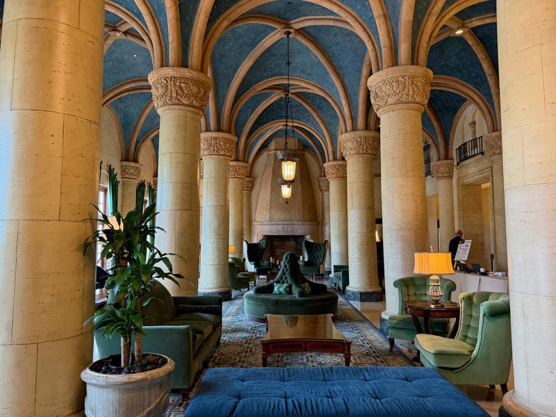 The lobby decorations match the hotel's historic, elevated vibe. Today, the hotel is loved by high-profile figures., Inside, the hotel has kept its original, century-old lobby., The lobby decorations match the hotel's historic, elevated vibe., The lobby also serves as a dining area for afternoon tea., Downstairs, the hotel's Fontana restaurant partially sits in an open-air courtyard., Fontana serves Italian-inspired dishes., Brandi's, the hotel's dark, moody bar, draws inspiration from the Biltmore's past., At the 600-gallon pool, there's poolside dining and nine private cabanas., The Biltmore's clubhouse is the center of events at the property., Next to the course are spaces for relaxing and socializing., Tucked in the clubhouse, there's also a members-only lounge.
