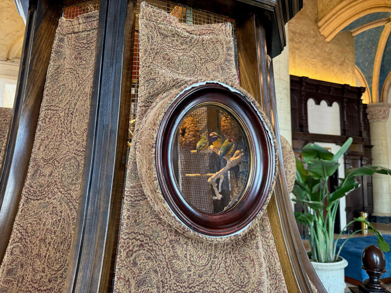 Live finches inside carved wooden bird cages fill the lobby with life and song. Today, the hotel is loved by high-profile figures., Inside, the hotel has kept its original, century-old lobby., The lobby decorations match the hotel's historic, elevated vibe., The lobby also serves as a dining area for afternoon tea., Downstairs, the hotel's Fontana restaurant partially sits in an open-air courtyard., Fontana serves Italian-inspired dishes., Brandi's, the hotel's dark, moody bar, draws inspiration from the Biltmore's past., At the 600-gallon pool, there's poolside dining and nine private cabanas., The Biltmore's clubhouse is the center of events at the property., Next to the course are spaces for relaxing and socializing., Tucked in the clubhouse, there's also a members-only lounge.