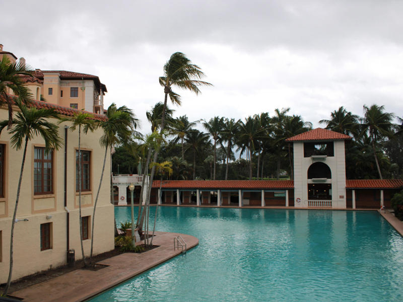 At the 600-gallon pool, there's poolside dining and nine private cabanas. Today, the hotel is loved by high-profile figures., Inside, the hotel has kept its original, century-old lobby., The lobby decorations match the hotel's historic, elevated vibe., The lobby also serves as a dining area for afternoon tea., Downstairs, the hotel's Fontana restaurant partially sits in an open-air courtyard., Fontana serves Italian-inspired dishes., Brandi's, the hotel's dark, moody bar, draws inspiration from the Biltmore's past., At the 600-gallon pool, there's poolside dining and nine private cabanas., The Biltmore's clubhouse is the center of events at the property., Next to the course are spaces for relaxing and socializing., Tucked in the clubhouse, there's also a members-only lounge.