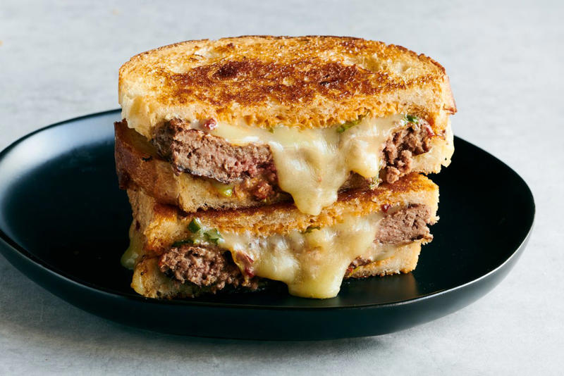 Grilled Burgers Stuffed with Pimiento Cheese, Super-Fast Classic Lasagna, Classic Meatloaf, Picadillo, Classic Beef Chili, Patty Melts with Charred Scallion–Chipotle Mayo, Beef and Cheese Red Chile Enchiladas, Bolognese Meat Sauce, Mini Potato, Steak, and Chorizo Pies, Ground Beef Bulgogi Sloppy Joes with Fiery Napa Slaw, Ground Beef Lasagna, Juicy Lucy Cheeseburger, Beef-and-Fonio Meatballs with Sweet Potato Stew, Lamb and Beef Burek, Poblanos Rellenos de Picadillo Dulce, Frito Pie, Gina Mae's Baked Beans, Baked Shells with Pesto, Mozzarella, and Meat Sauce, Japanese-Style Chili Burgers with Yuzu Mayo, Sogogi Oi Bokkeum (Korean Stir-Fried Cucumber and Beef), Tex-Mex Cavatappi, Grilled Meatballs with Mint and Za'atar, Garlic Beef and Onion Congee, Hamburger Helpa, Beef Keema, Mini Panamanian Beef Empanadas, Spiced Harissa Ragù with Tahini Yogurt, Beef and Vegetable Pot Pie with Cheddar Biscuits, Nachos in a Bag, Soboro Donburi (Gingery Ground Beef with Peas over Rice), Taco Dip, Hungarian Beef and Potato Soup, Thai-Style Beef Salad Over Angel Hair Pasta
