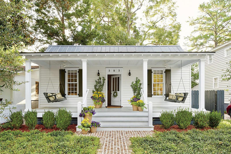 Why Curb Appeal Is Important, According To Experts, Add a Garden Path, Tidy Your Landscaping, Choose Plants That Thrive, Power-Wash Your Patio, Upgrade Your Garage Door, Flank Your Entry, Paint Strategically, Don’t Overlook Your Hardware, Opt for Architectural Lighting, Incorporate Natural Elements