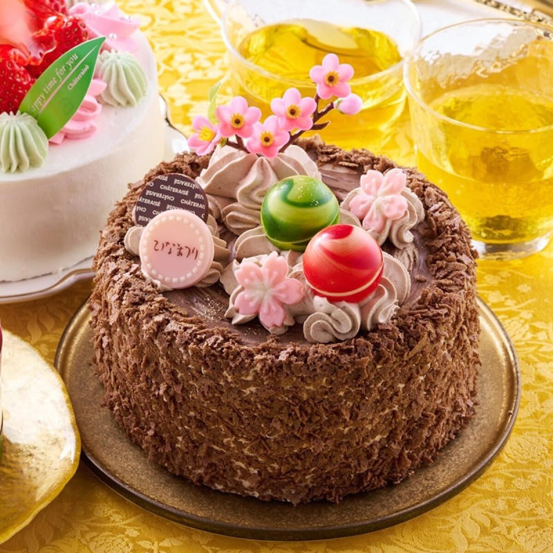 ひなまつり限定！『桃の節句 ちいさなひなケーキ（ピンク）』, 食べきりサイズ！『桃の節句 チョコショート』, 春の訪れを感じる！『春いちごと桃のふんわりケーキ』, チョコ好きにはたまらない！『ひなかざり ショコラ・ノワール 14cm』, お祝いにピッタリ！『桃の節句 ひし形デコレーション』