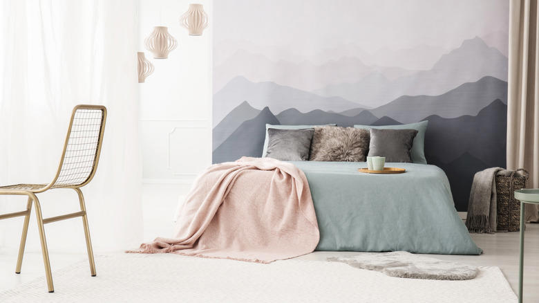 Accent wall, Unique artwork, Soft fabrics, Graphic murals, Repurposed home decor, Practical shelving, Found objects, Thrifted finds, Reflective mirror, Old doors, Pillows, pillows, and more pillows