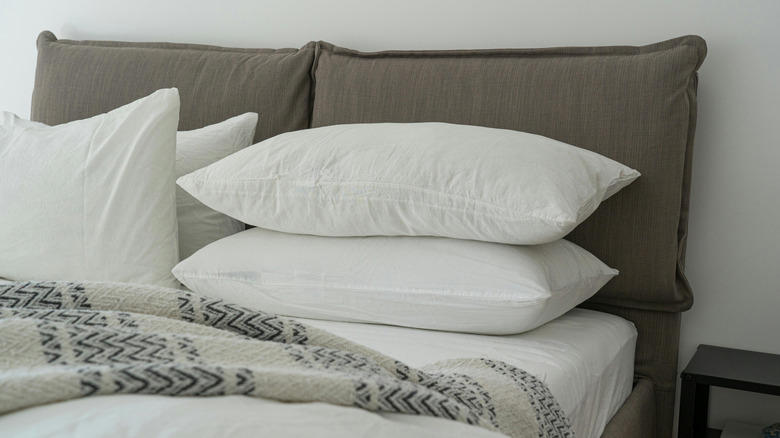 Accent wall, Unique artwork, Soft fabrics, Graphic murals, Repurposed home decor, Practical shelving, Found objects, Thrifted finds, Reflective mirror, Old doors, Pillows, pillows, and more pillows