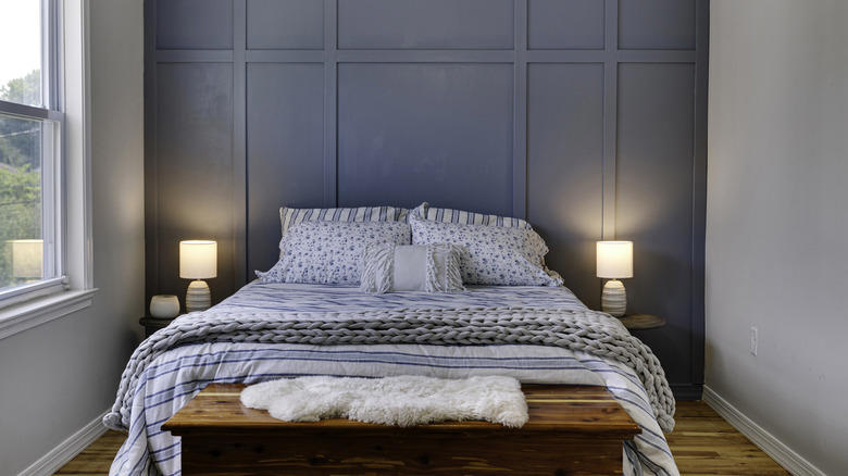 Accent wall, Unique artwork, Soft fabrics, Graphic murals, Repurposed home decor, Practical shelving, Found objects, Thrifted finds, Reflective mirror, Old doors, Pillows, pillows, and more pillows