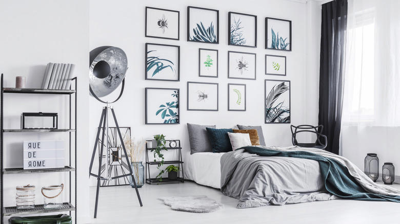 Accent wall, Unique artwork, Soft fabrics, Graphic murals, Repurposed home decor, Practical shelving, Found objects, Thrifted finds, Reflective mirror, Old doors, Pillows, pillows, and more pillows