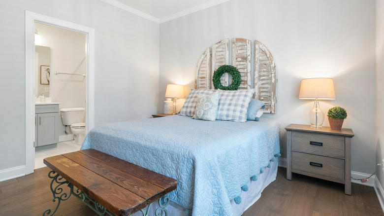 Accent wall, Unique artwork, Soft fabrics, Graphic murals, Repurposed home decor, Practical shelving, Found objects, Thrifted finds, Reflective mirror, Old doors, Pillows, pillows, and more pillows