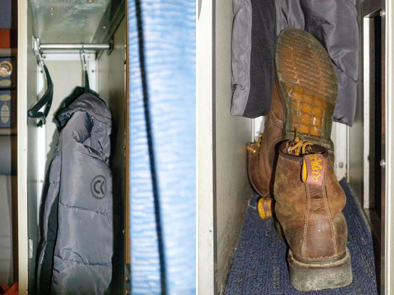There was also a narrow closet at the front of the room. When I first boarded the train, there were no bunks in sight., There was also a narrow closet at the front of the room., Across from the closet, there was a sink and vanity., I used the shelf above the single seat to store my luggage., I found room controls on either side of the couch., Among these controls was a night setting for the lights., I slept in the bottom bunk on the second night.