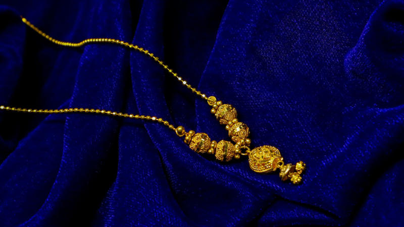 1. Classic Gold Hoop Earrings, 2. A Delicate Gold Chain Necklace, 3. Gold Stud Earrings, 4. A Gold Pendant Necklace, 5. A Gold Cuff Bracelet, 6. A Gold Signet Ring, 7. A Gold Layered Necklace Set, 8. A Gold Anklet, 9. A Gold Watch, 10. A Gold Chain Bracelet, 1. Sculptural Drop Earrings, 2. A Wide Gold Bangle, 3. A Gold Collar Necklace, 4. Statement Pearl-and-Gold Earrings, 5. A Chunky Gold Chain Necklace, 6. A Gold Cocktail Ring, 7. A Gold Brooch or Pin, 8. Gold Ear Cuffs, 9. A Two-Tone Gold Necklace, 10. A Gold Hair Accessory
