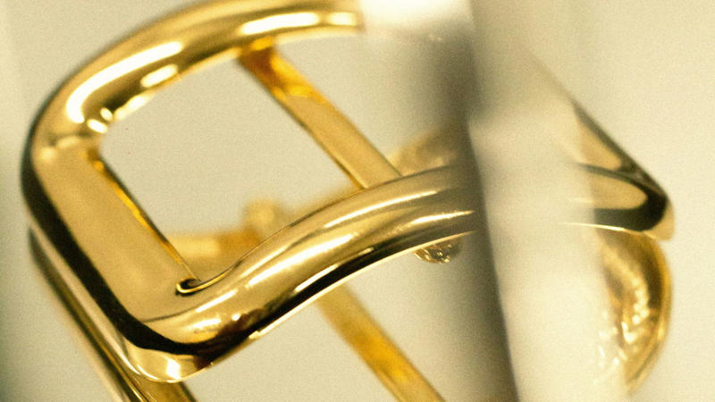 1. Classic Gold Hoop Earrings, 2. A Delicate Gold Chain Necklace, 3. Gold Stud Earrings, 4. A Gold Pendant Necklace, 5. A Gold Cuff Bracelet, 6. A Gold Signet Ring, 7. A Gold Layered Necklace Set, 8. A Gold Anklet, 9. A Gold Watch, 10. A Gold Chain Bracelet, 1. Sculptural Drop Earrings, 2. A Wide Gold Bangle, 3. A Gold Collar Necklace, 4. Statement Pearl-and-Gold Earrings, 5. A Chunky Gold Chain Necklace, 6. A Gold Cocktail Ring, 7. A Gold Brooch or Pin, 8. Gold Ear Cuffs, 9. A Two-Tone Gold Necklace, 10. A Gold Hair Accessory
