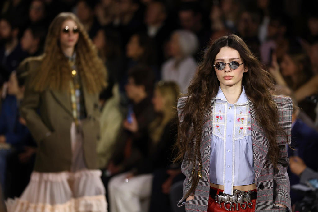 The tuxedo is back — again, Skin is in, Craft gets weird in a good way, Fringe and texture go hard, Minimalism with a pulse, The urban woman at speed