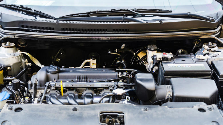 1. Check engine light, 2. Unusual exhaust smoke, 3. Unusual smells, 4. Strange noises from the engine bay