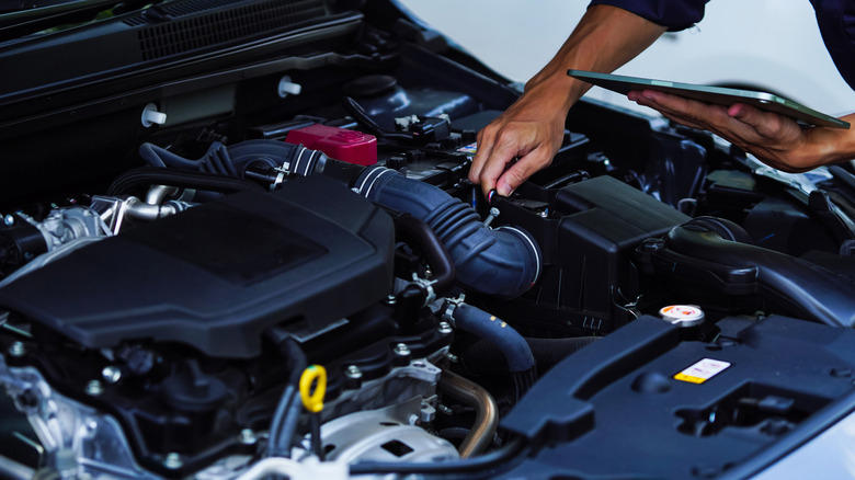 1. Check engine light, 2. Unusual exhaust smoke, 3. Unusual smells, 4. Strange noises from the engine bay