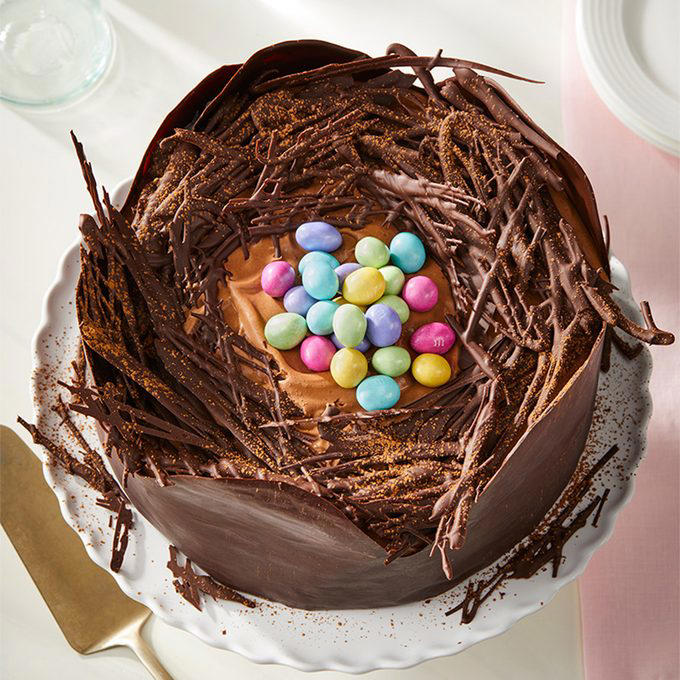 Build an Easter Candy Charcuterie Board, Braid an Easter Bread, Make a New Twist on a Bunny Cake, Dip Homemade Peanut Butter Eggs, Add Springtime Flair to the Table, Host Brunch, Dye Eggs, Build a Nest, Play a Few Games, Create a Unique Centerpiece, Turn Carrot Cake on Its Head, Arrange Fresh Flowers, Turn Easter into Teatime, Stir Up a Signature Easter Cocktail, Serve All Kinds of Deviled Eggs, Make Adult Easter Baskets, Bake an Easter Ham, Try a New Easter Craft, Create a Towering Dessert, Use the Good China, Decorate a Lamb Cake, Create Flower Pot Favors or Place Cards, Bake Resurrection Rolls, Go Back in Time, Dye Eggs the Natural Way, Fill Eggs for Everyone, Bake Hot Cross Buns, Add a Butter Lamb to the Table, Try Easter Lamb, Send Home Care Packages, Smash an Easter Piñata, Decorate an Easter Tree, Make a Festive Easter Wreath, Hide Bunnies Around the House, Get Creative with Peeps