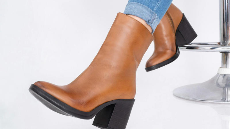 8. Slouchy Mid-Calf Boots 1. Classic Stiletto Heels, 2. Sleek Knee-High Boots, 3. Strappy Heeled Sandals, 4. Pointed-Toe Pumps, 5. Clean White Sneakers, 6. Chic Ankle Boots, 7. Elegant Ballet Flats, 8. Platform Heels, 9. Loafers With A Feminine Twist, 10. Statement Evening Heels, 1. Chunky Dad Sneakers, 2. Crocs, 3. Fuzzy Slide Sandals, 4. Clear Plastic Heels, 5. Espadrille Wedges, 6. Pointed-Toe Flats, 7. Gladiator Sandals, 8. Slouchy Mid-Calf Boots, 9. Cork Sole Flip-Flops, 10. Sneaker Heels