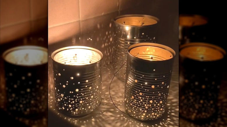 Repurpose a soup can into an adorable planter, Craft metal luminaries from empty soup cans, Transform a metal can into a unique bathroom vase, Make soup cans into chic, vintage-inspired desk organizers, Design a shabby chic carrying caddy from soup containers, Turn a ribbed can into a utensil crock, Decoupage metal cans into labeled pencil holders, Collect cans to make a wind chime, Hang a soup can as a basic bird feeder, Craft farmhouse decor with a smashed soup can, Transform a tin can into a nautical vase for coastal decor, Build a portable tool case out of metal cans, DIY an industrial wine rack from tin cylinders, Create festive tin can streamers