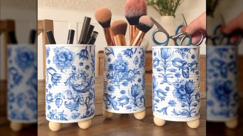 Repurpose a soup can into an adorable planter, Craft metal luminaries from empty soup cans, Transform a metal can into a unique bathroom vase, Make soup cans into chic, vintage-inspired desk organizers, Design a shabby chic carrying caddy from soup containers, Turn a ribbed can into a utensil crock, Decoupage metal cans into labeled pencil holders, Collect cans to make a wind chime, Hang a soup can as a basic bird feeder, Craft farmhouse decor with a smashed soup can, Transform a tin can into a nautical vase for coastal decor, Build a portable tool case out of metal cans, DIY an industrial wine rack from tin cylinders, Create festive tin can streamers