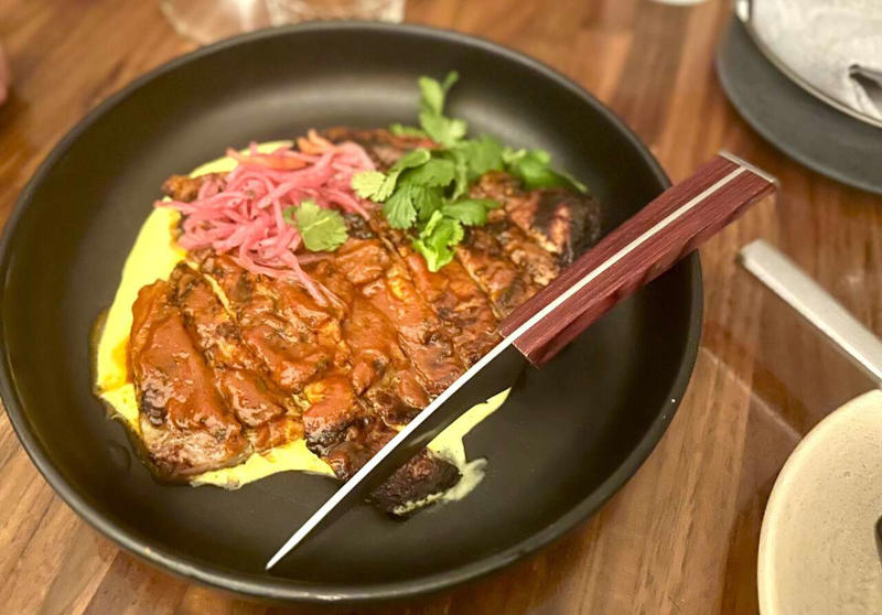 Filet mignon and frites at Hopfields, Quince and manchego empanada at Tzintzuntzan, Hunan pork stir-fry at Hunan Bistro, Pho at Pho Phong Lu, Pretzel "bagel" with lox at Easy Tiger, Pork chop at ATX Cocina, Chicken Parmesan at Birdie's Aiello's pop-up, Crab tostada at La Piscina, Beef enchiladas at Habanero, Tom kha at Thai Fresh, Related Reading, Subscribe