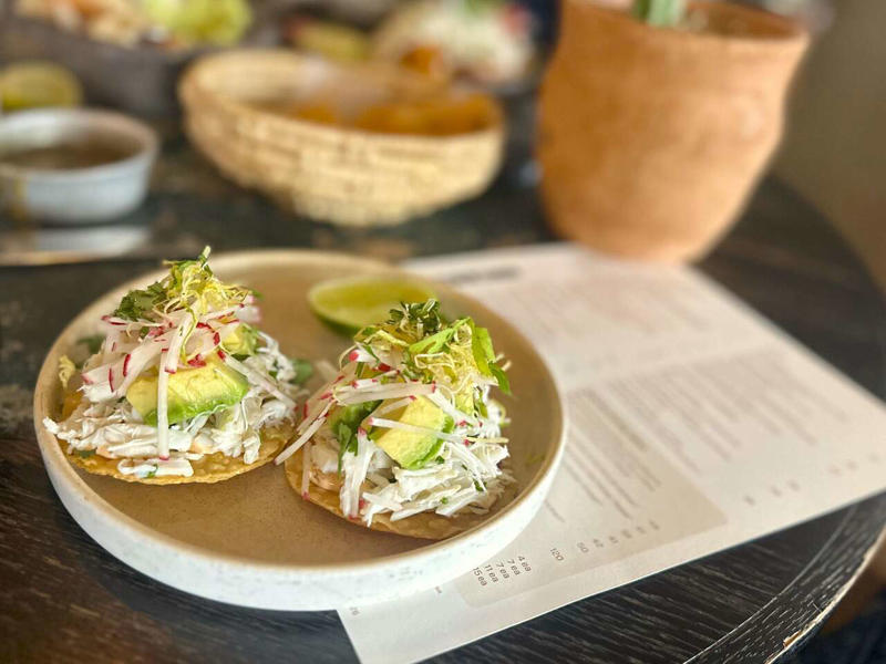 Filet mignon and frites at Hopfields, Quince and manchego empanada at Tzintzuntzan, Hunan pork stir-fry at Hunan Bistro, Pho at Pho Phong Lu, Pretzel "bagel" with lox at Easy Tiger, Pork chop at ATX Cocina, Chicken Parmesan at Birdie's Aiello's pop-up, Crab tostada at La Piscina, Beef enchiladas at Habanero, Tom kha at Thai Fresh, Related Reading, Subscribe