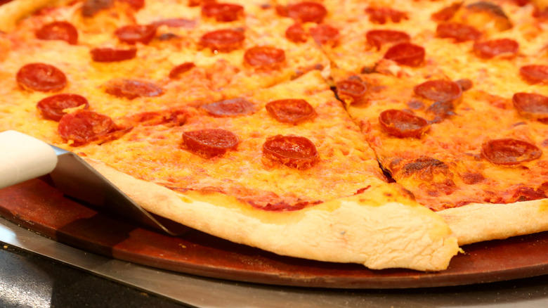 Excessive topping choices are usually a mask for a lack of focus, Visible machinery signals a shop's respect for the dough, A chef's pride is the ultimate indicator of quality, Sometimes a great experience can outshine a mid-tier pizza
