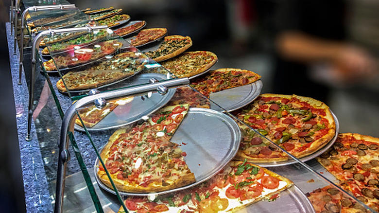 Excessive topping choices are usually a mask for a lack of focus, Visible machinery signals a shop's respect for the dough, A chef's pride is the ultimate indicator of quality, Sometimes a great experience can outshine a mid-tier pizza