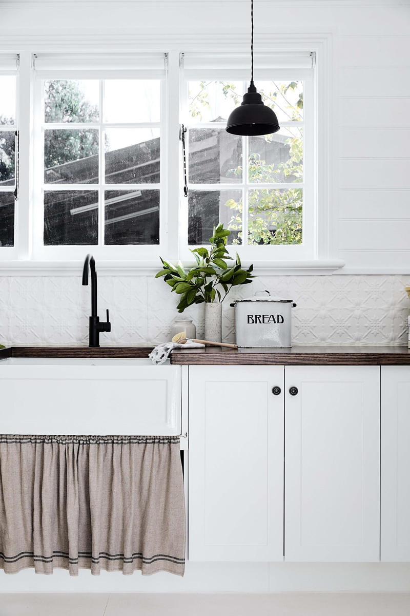 What is the purpose of a sink skirt?, How to choose the right skirt for your space, How do you make a sink skirt?, 12 ways to use sink skirts in your home ,      Green bathroom sink skirt   ,      Foam House laundry sink skirt   ,      English cottage bathroom sink skirt   ,      Keppel Sands laundry sink skirt   ,      Kara Rosenlund’s studio kitchen sink skirt   ,      Bungaberg kitchen sink skirt   ,      Cloud River Farm kitchen sink skirt   ,      Vintage kitchen sink skirt   ,      Marge’s Cottage kitchen sink skirt   ,      Old miner’s cottage kitchen sink skirt   ,      California bungalow kitchen sink skirt   ,      Bungalow kitchen sink skirt   ,      Weatherboard cottage kitchen sink skirt   