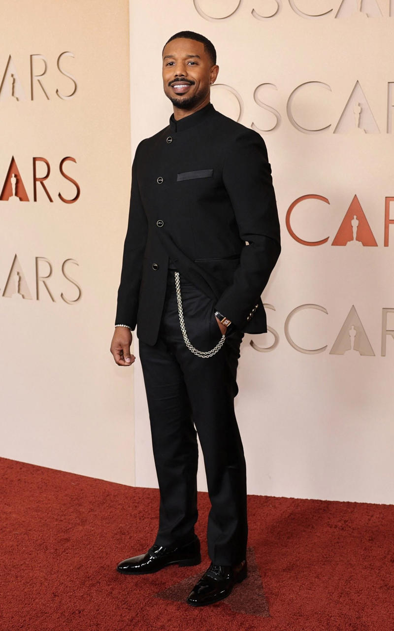Michael B. Jordan Oscars 2026, Jane Fonda, Sarah Pidgeon in Calvin Klein, Olivia Rodrigo in Saint Laurent, Naomi Watts in Balenciaga, Monica Lewinsky in Oscar de la Renta, Kim Kardashian in Gucci, Wendi Deng Murdoch and Grace Murdoch, Minnie Driver, Nicole Kidman, Marisa Abela in Revolve, Zoe Saldana in Saint Laurent, Helen Hunt in Stella McCartney, Hailey Bieber in Giorgio Armani, Kaia Gerber in Givenchy, Colman Domingo in Jacquemus, Philippine Leroy-Beaulieu, Sir Mick Jagger and Melanie Hamrick, Jeff Goldblum and Emilie Livingston in ERL Artisanal, Cara Delevingne in Thom Browne, Karlie Kloss in Gucci, Anjelica Huston, Sarah Paulson and Holland Taylor, Leslie Mann, Meg Ryan, Lauren Sanchez Bezos and Jeff Bezos, Tracee Ellis Ross in Marine Serre, Dree Hemingway in Conner Ives, Isla Fisher in Yara Shoemaker, Jessica Alba in Tamara Ralph, Kris Jenner in vintage Valentino, Rachel Sennott in Balenciaga, Dua Lipa and Callum Turner, Kristen Wiig in Monse, Elle and Dakota Fanning, Simone Ashley, Laura Harrier in Gucci, Kendall Jenner in Chanel, Grace Gummer, Mamie Gummer, Louisa Jacobson in Khaite, Suki Waterhouse and Robert Pattinson, Rita Ora in Tamara Ralph, Jessie Buckley in Chanel, Nicole Kidman in Chanel, Rose Byrne in Dior, Teyana Taylor in Chanel, Renate Reinsve in Louis Vuitton, Timothée Chalamet in Givenchy, Kylie Jenner in Schiaparelli, Demi Moore in Gucci, Gwyneth Paltrow in Armani Privé, Michael B. Jordan in Louis Vuitton, Zendaya and Robert Pattinson, Emma Stone in Louis Vuitton, Kate Hudson and Goldie Hawn, Chase Infiniti in Louis Vuitton, Felicity Jones in Prada, Anne Hathaway in Valentino, Odessa A’zion in Valentino, Wunmi Mosaku in Louis Vuitton, Elle Fanning in Givenchy, Kirsten Dunst and Jesse Plemons, Amy Madigan in Dior, Zoe Saldaña in Saint Laurent, Mia Goth in Dior, Paul Mescal and Gracie Abrams, Inga Ibsdotter Lilleaas in Loewe, Mikey Madison in Dior, Rachel McAdams in Alberta Ferretti, Mckenna Grace, Pedro Pascal in Chanel, Barbie Ferreira in GapStudio, Adrien Brody in Gucci, Jacob Elordi in Bottega Veneta, Charithra Chandran in Miss Sohee, EJAE in Dior, Audrey Nuna in Thom Browne, Rei Ami in Rahul Mishra, Huma Abedin and Anna Wintour, Leonardo DiCaprio in Dior, Kate Hawley, Damson Idris in Prada, Sigourney Weaver in Valentino, Alana Haim in Louis Vuitton, Heidi Klum, Hudson Williams in Balenciaga, Alicia Silverstone, Channing Tatum in Versace, Kathy Bates, Chloe Zhao, Joel Edgerton, Misty Copeland in David Koma, Maya Rudolph in Chanel, Ava DuVernay in Louis Vuitton, Anna Wintour, Benicio Del Toro in Giorgio Armani, Usher in Giuliva Heritage, Melissa McCarthy, Jack O’Connell in Dunhill, Lola Kirke in Simone Rocha, Fran Drescher in Ami, Jason Bateman in Dunhill, Ariana Greenblatt in John Galliano, Stellan Skarsgård, Kristen Wiig in Elie Saab, Jacobi Jupe, Kieran Culkin in Paul Smith, Nick Jonas and Priyanka Chopra Jonas, Wagner Moura in Zegna, Conan O’Brien, Vicky Krieps in Bottega Veneta, Ethan Hawke, Shaboozey in Campillo, Spike Lee, Joe Alwyn in Valentino, Kevin O’Leary, Ryan Destiny in Ami, Javier Bardem, Mark Strong in Giorgio Armani, Felix Kammerer in Saint Laurent, Ginnifer Goodwin in Monse, Susie and Nick Cave, Amelia Dimoldenberg in Ralph Lauren, Manu Rios in Saint Laurent